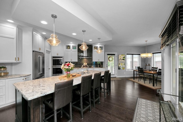 19861 County Road 16, Bristol, IN 46507 - kitchen featuring stainless steel appliances, decorative backsplash, baseboards, white cabinets, and recessed lighting