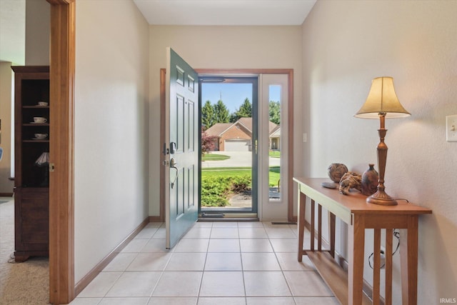 1916 Greenwood Dr, Goshen, IN 46526 - foyer entrance with baseboards and light tile patterned floors