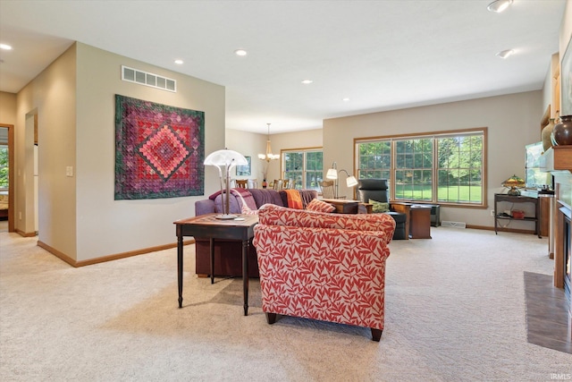 1916 Greenwood Dr, Goshen, IN 46526 - living area with light carpet, baseboards, recessed lighting, and a chandelier