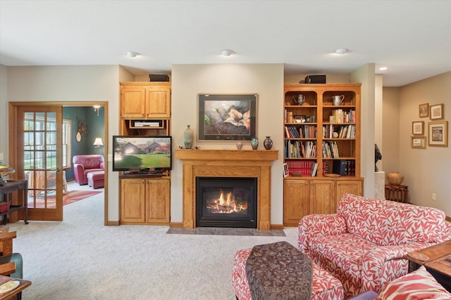 1916 Greenwood Dr, Goshen, IN 46526 - living area with carpet floors, a fireplace with flush hearth, and recessed lighting