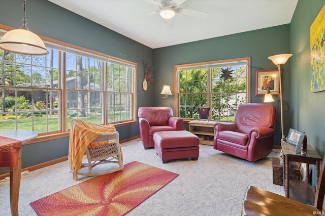 1916 Greenwood Dr, Goshen, IN 46526 - living room featuring carpet flooring, plenty of natural light, a ceiling fan, and baseboards