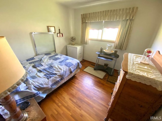 260 W Prairie St, Lyons, IN 47443 - bedroom featuring wood finished floors