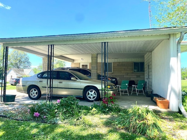 260 W Prairie St, Lyons, IN 47443 - view of parking with an attached carport