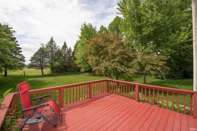 wooden deck with a yard