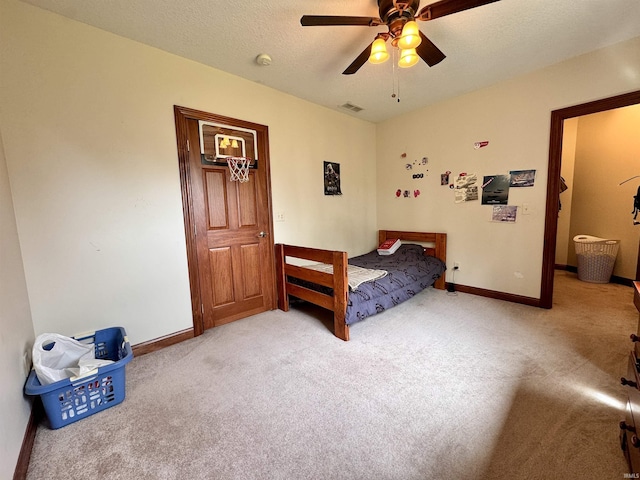 5936 County Road 427, Auburn, IN 46706 - carpeted bedroom with baseboards and a ceiling fan