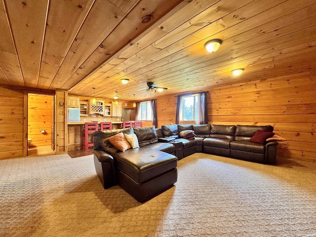 5936 County Road 427, Auburn, IN 46706 - living area with wooden ceiling, wooden walls, carpet flooring, a dry bar, and ceiling fan