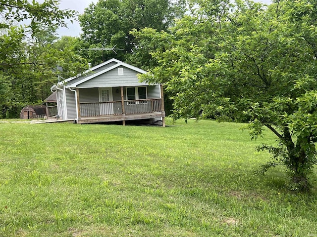 5861 Jordan Village Rd, Poland, IN 47868 - view of front of house with covered porch and a front lawn