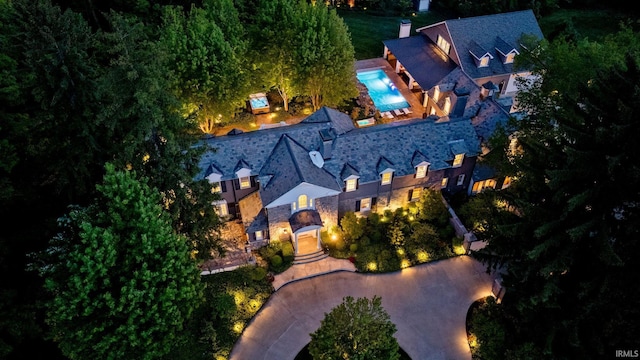 view of subject property featuring a pool area