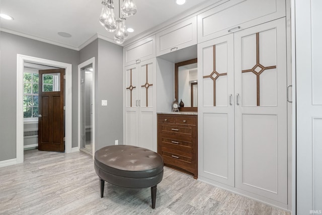 sitting room featuring light wood-style floors, ornamental molding, baseboards, a chandelier, and recessed lighting
