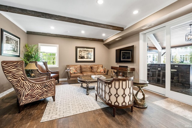 living area with hardwood / wood-style flooring, beamed ceiling, baseboards, recessed lighting, and crown molding