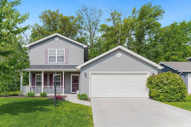7725 Payne Pkwy, Fort Wayne, IN 46818 - traditional-style house featuring a porch, a garage, concrete driveway, and a front lawn