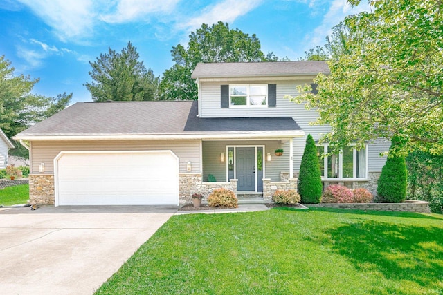 3807 S Laura Way, Bloomington, IN 47401 - view of front of home with stone siding, an attached garage, a porch, a front lawn, and concrete driveway