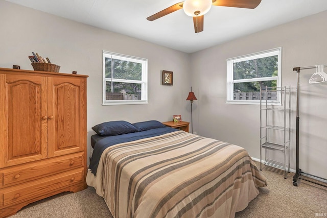 1500 El Prado St, Lafayette, IN 47905 - bedroom with light carpet, multiple windows, and ceiling fan