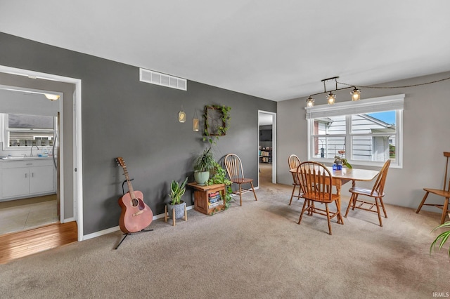 1500 El Prado St, Lafayette, IN 47905 - dining area featuring light colored carpet