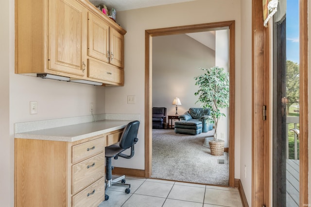 9725 Sea View Cv, Fort Wayne, IN 46835 - office with built in desk, light colored carpet, plenty of natural light, and light tile patterned floors