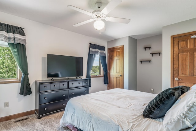9725 Sea View Cv, Fort Wayne, IN 46835 - bedroom with baseboards, light carpet, and ceiling fan