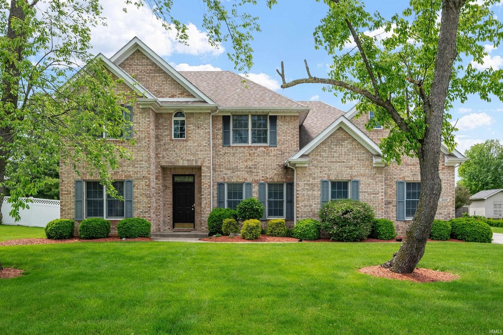 509 Greenland Ln, Yorktown, IN 47396 - view of front facade featuring brick siding and a shingled roof