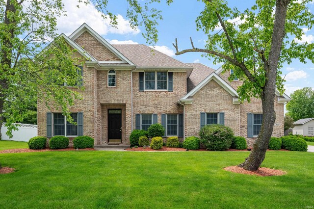 509 Greenland Ln, Yorktown, IN 47396 - view of front facade featuring brick siding and a shingled roof
