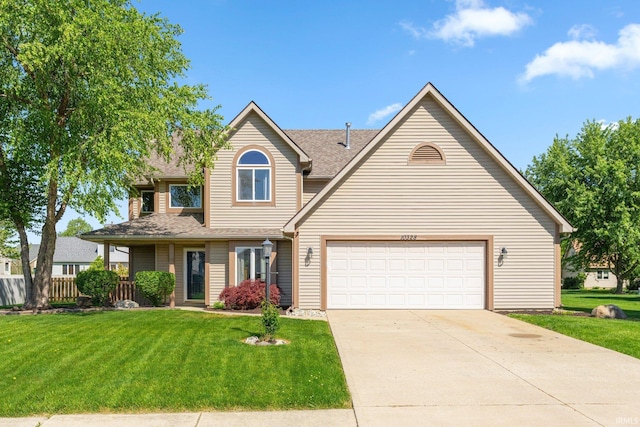 traditional home with a front yard, concrete driveway, and a shingled roof