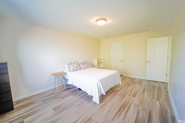 2027 Wesmar Ct, Kokomo, IN 46902 - bedroom with light wood-type flooring and baseboards