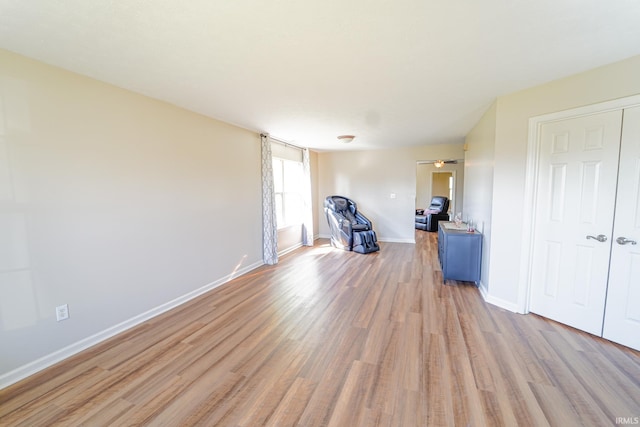 2027 Wesmar Ct, Kokomo, IN 46902 - unfurnished living room featuring light wood-type flooring and baseboards