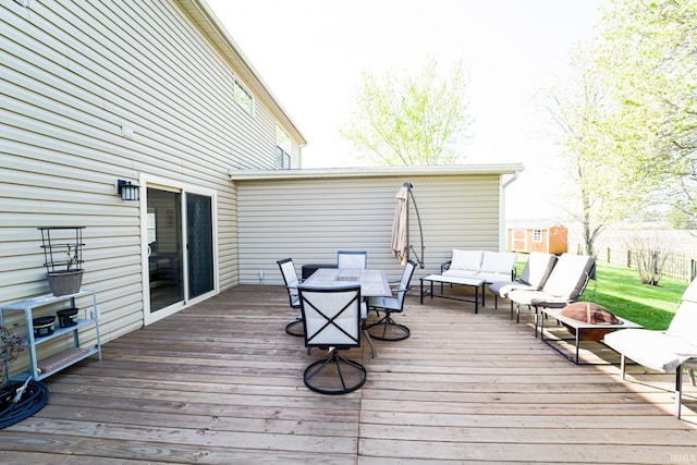2027 Wesmar Ct, Kokomo, IN 46902 - wooden deck featuring an outdoor living space with a fire pit and outdoor dining area