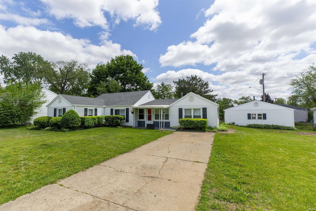 409 E Lowell Ave, Mishawaka, IN 46545 - single story home with a front yard and driveway