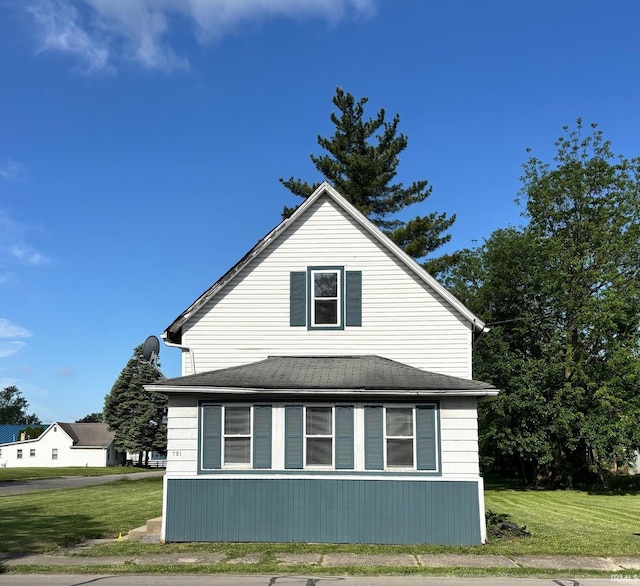 721 S Hackley St, Muncie, IN 47302 - view of home's exterior featuring a lawn