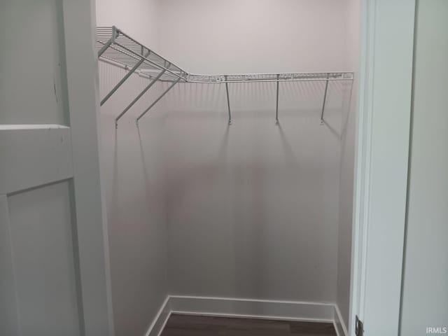 224 E 6th Ave, Ingalls, IN 46048 - spacious closet featuring dark wood-style flooring