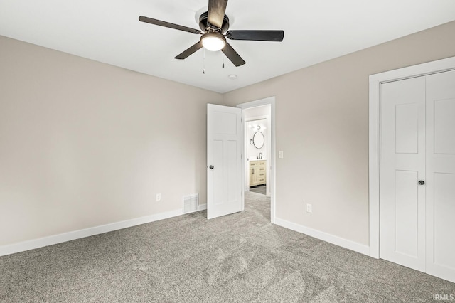209 Marquette Ave, South Bend, IN 46617 - unfurnished bedroom featuring carpet flooring, baseboards, and a ceiling fan