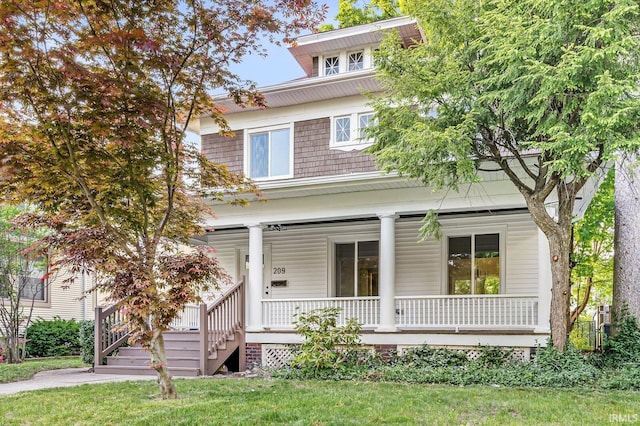 209 Marquette Ave, South Bend, IN 46617 - traditional style home with covered porch and a front yard