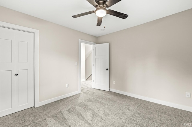 209 Marquette Ave, South Bend, IN 46617 - unfurnished bedroom featuring carpet, baseboards, a ceiling fan, and a closet