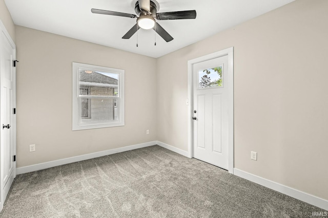 209 Marquette Ave, South Bend, IN 46617 - carpeted foyer with baseboards and ceiling fan