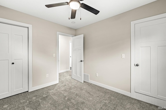 209 Marquette Ave, South Bend, IN 46617 - unfurnished bedroom featuring carpet floors, baseboards, and ceiling fan