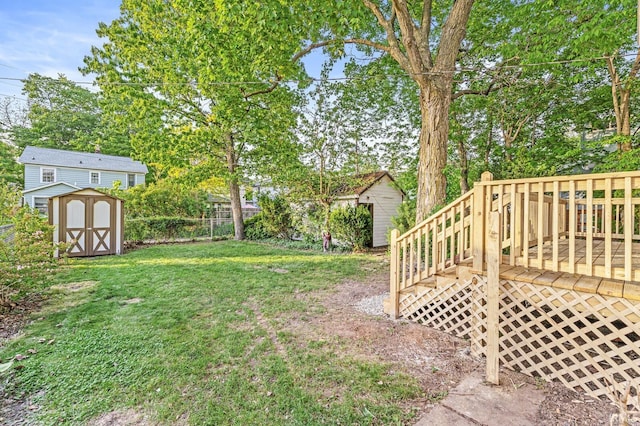 209 Marquette Ave, South Bend, IN 46617 - view of yard with a storage shed, a wooden deck, and an outdoor structure
