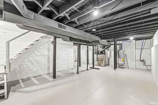 209 Marquette Ave, South Bend, IN 46617 - unfinished below grade area featuring gas water heater and heating unit