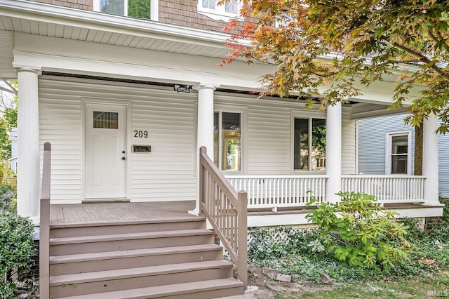 209 Marquette Ave, South Bend, IN 46617 - property entrance featuring a porch