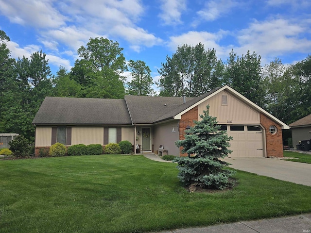 7827 Sunderland Dr, Fort Wayne, IN 46835 - ranch-style home with brick siding, an attached garage, driveway, and a front lawn