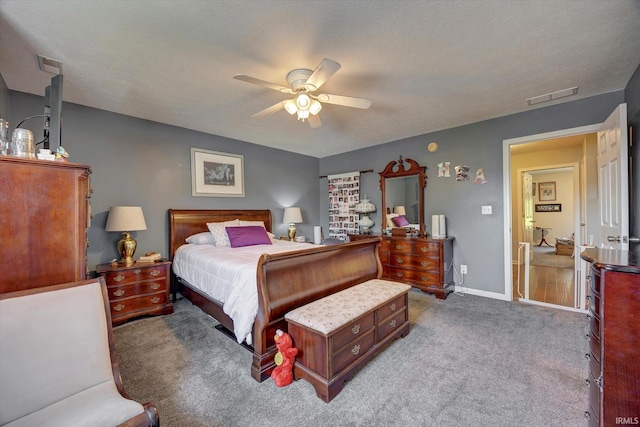 1177 E Marigold Dr, Bloomington, IN 47401 - bedroom with carpet flooring, a ceiling fan, and baseboards