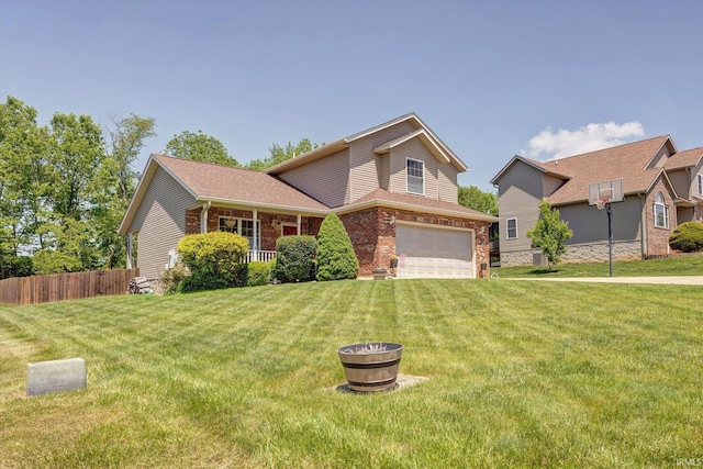 1177 E Marigold Dr, Bloomington, IN 47401 - view of front of home with a garage and brick siding