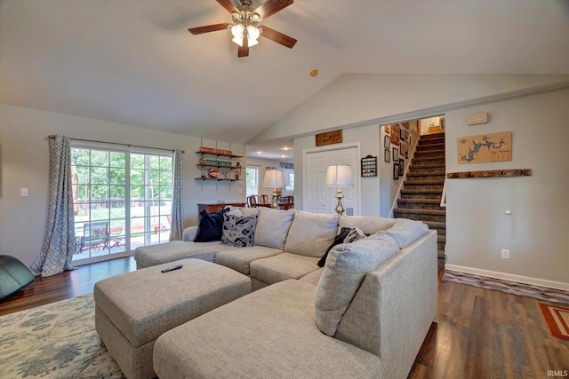 1177 E Marigold Dr, Bloomington, IN 47401 - living room featuring vaulted ceiling, a ceiling fan, stairway, and dark wood-style flooring
