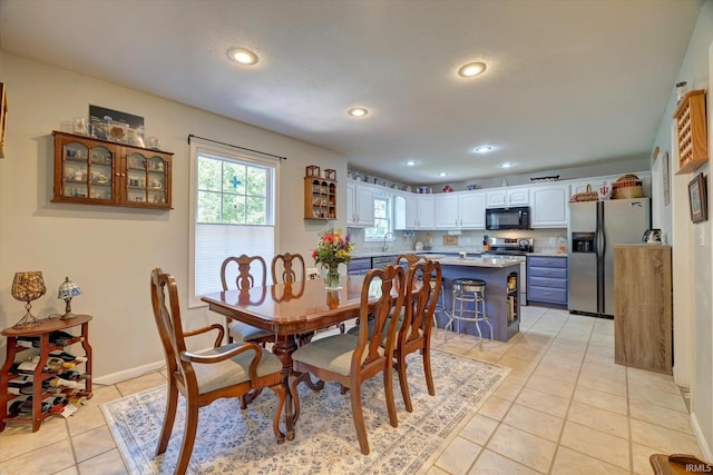1177 E Marigold Dr, Bloomington, IN 47401 - dining area with light tile patterned flooring, recessed lighting, and baseboards