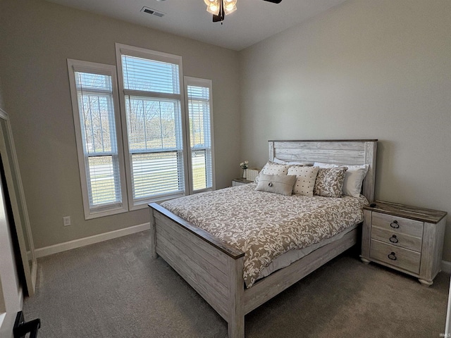 bedroom featuring carpet flooring, baseboards, and a ceiling fan