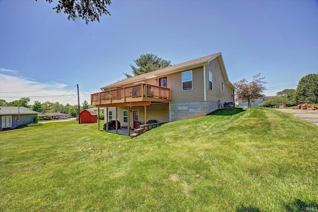 4110 E 10th St, Bloomington, IN 47408 - rear view of property with a lawn, a deck, and a patio area
