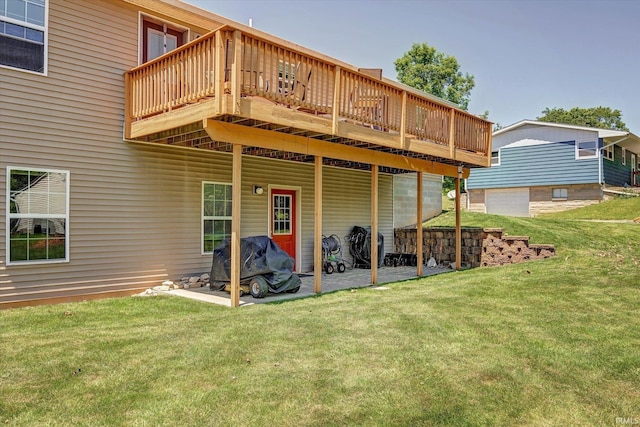 4110 E 10th St, Bloomington, IN 47408 - back of house with a yard, a patio area, an attached garage, and a deck
