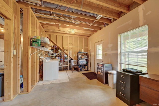 4110 E 10th St, Bloomington, IN 47408 - basement featuring washer and clothes dryer