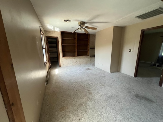 3613 Robin Dr, Kokomo, IN 46902 - unfurnished living room featuring ceiling fan and carpet flooring
