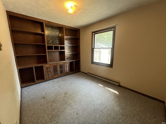 3613 Robin Dr, Kokomo, IN 46902 - unfurnished room with a baseboard radiator, a textured ceiling, carpet floors, and baseboards