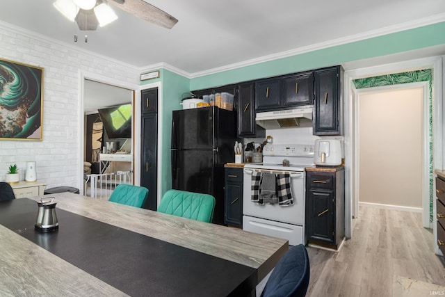 kitchen with white electric stove, under cabinet range hood, freestanding refrigerator, dark cabinetry, and crown molding