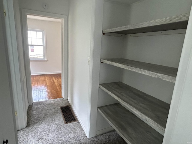 3534 Oakcrest Dr, South Bend, IN 46615 - corridor featuring baseboards and carpet
